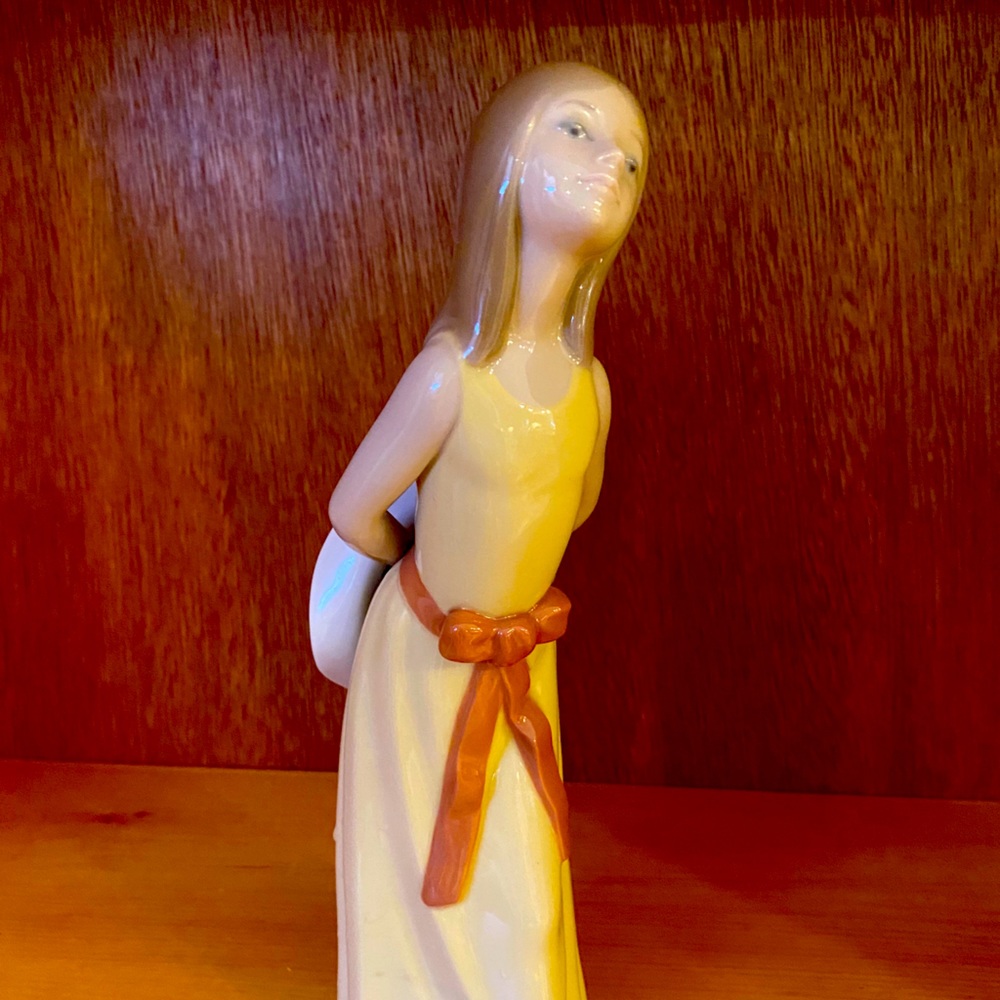 Lladro “ Naughty Girl with Sunhat and Ribbon”